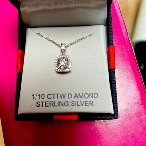 Beautiful sterling silver 1/10 CTTW diamond necklace.